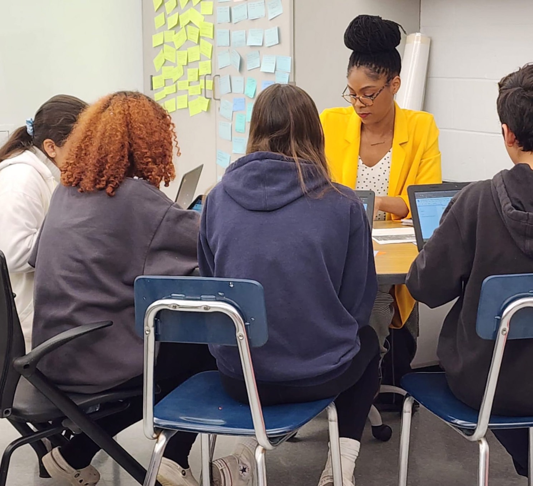 Dr. Joyce with educators and students